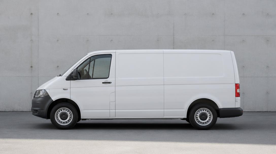 White cargo van parked against a concrete wall representing B2B courier services